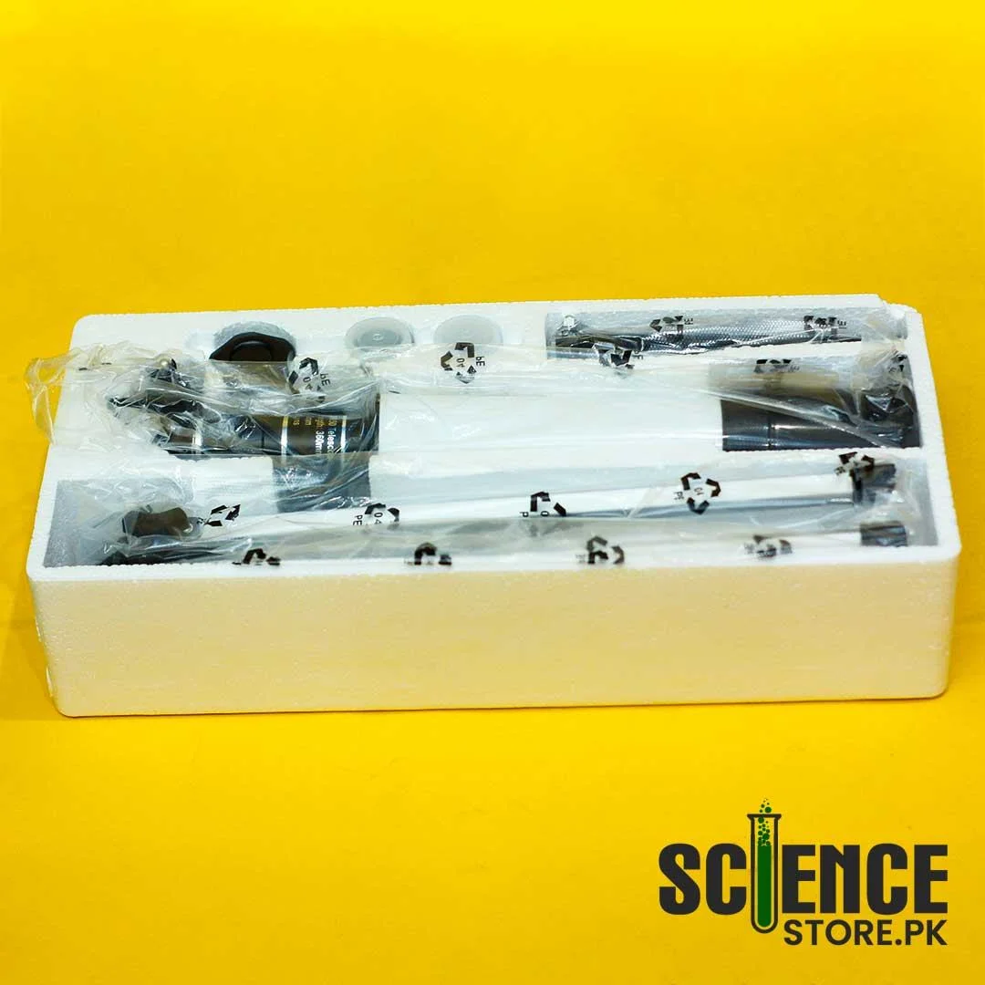 Telescope and its parts packed in a moulded polystyrene box.