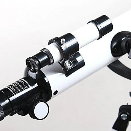 Finder scope clamped to the tube just above its focuser knob