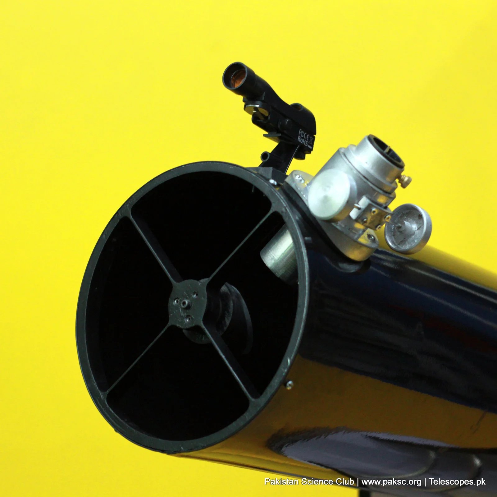 Looking down the open tube at a four-vane spider and secondary mirror