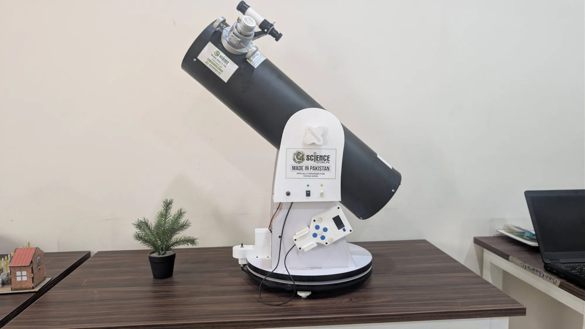 RVision GT 6-750 on a desk, showing the Made in Pakistan label on its base.