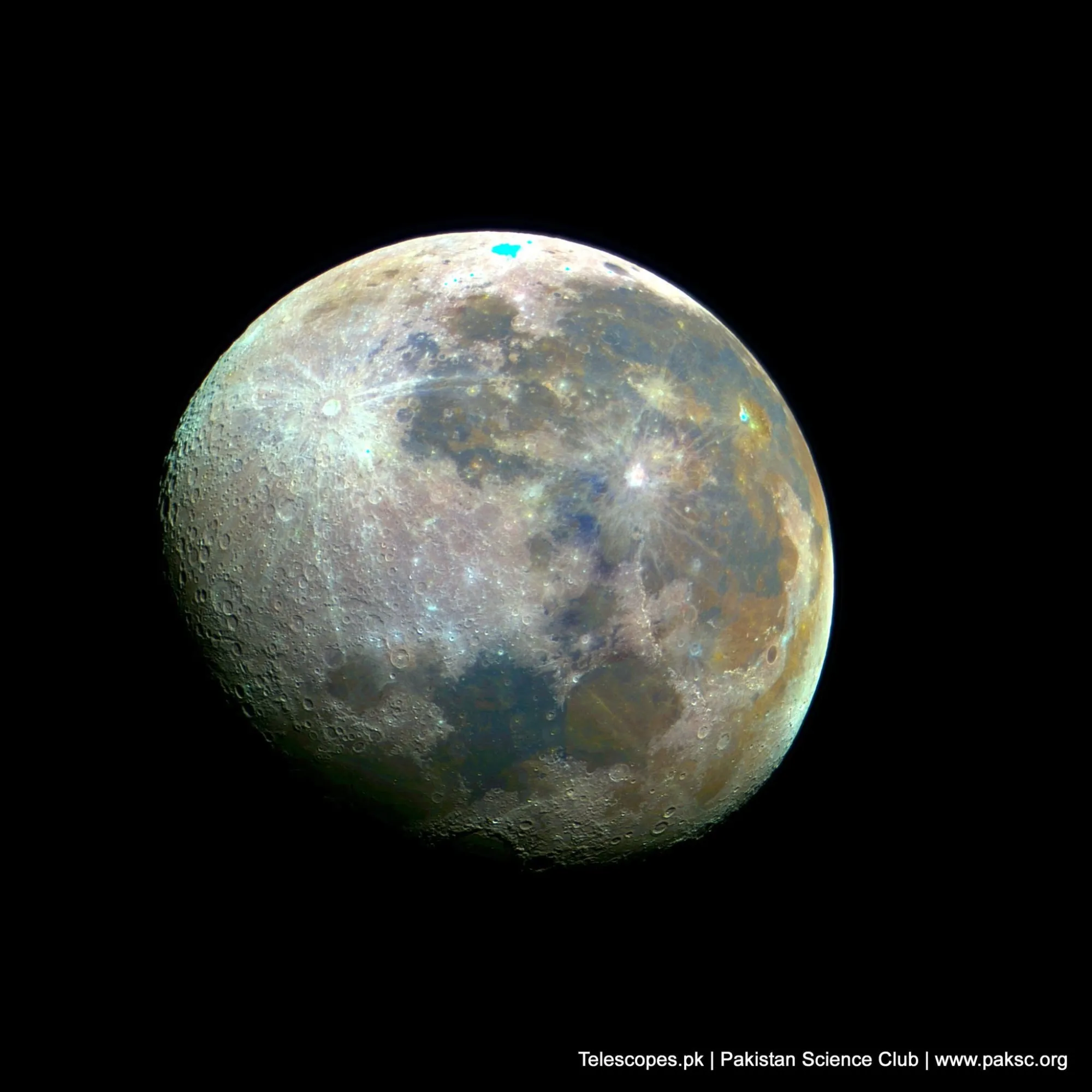 A colour-enhanced photograph of the Moon, its surface tinted to show differences in the lunar soil.
