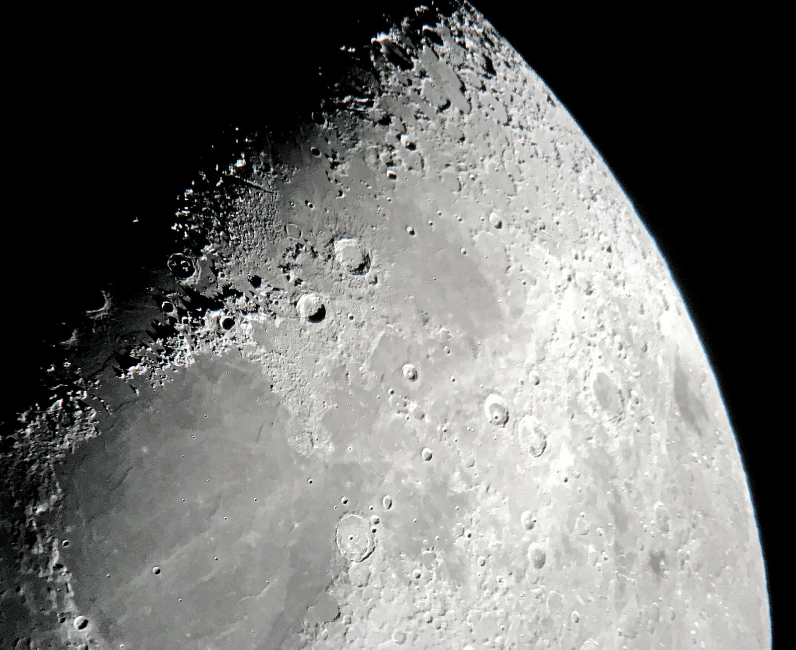 Close-up of lunar craters near the terminator, photographed through the RV6-750.
